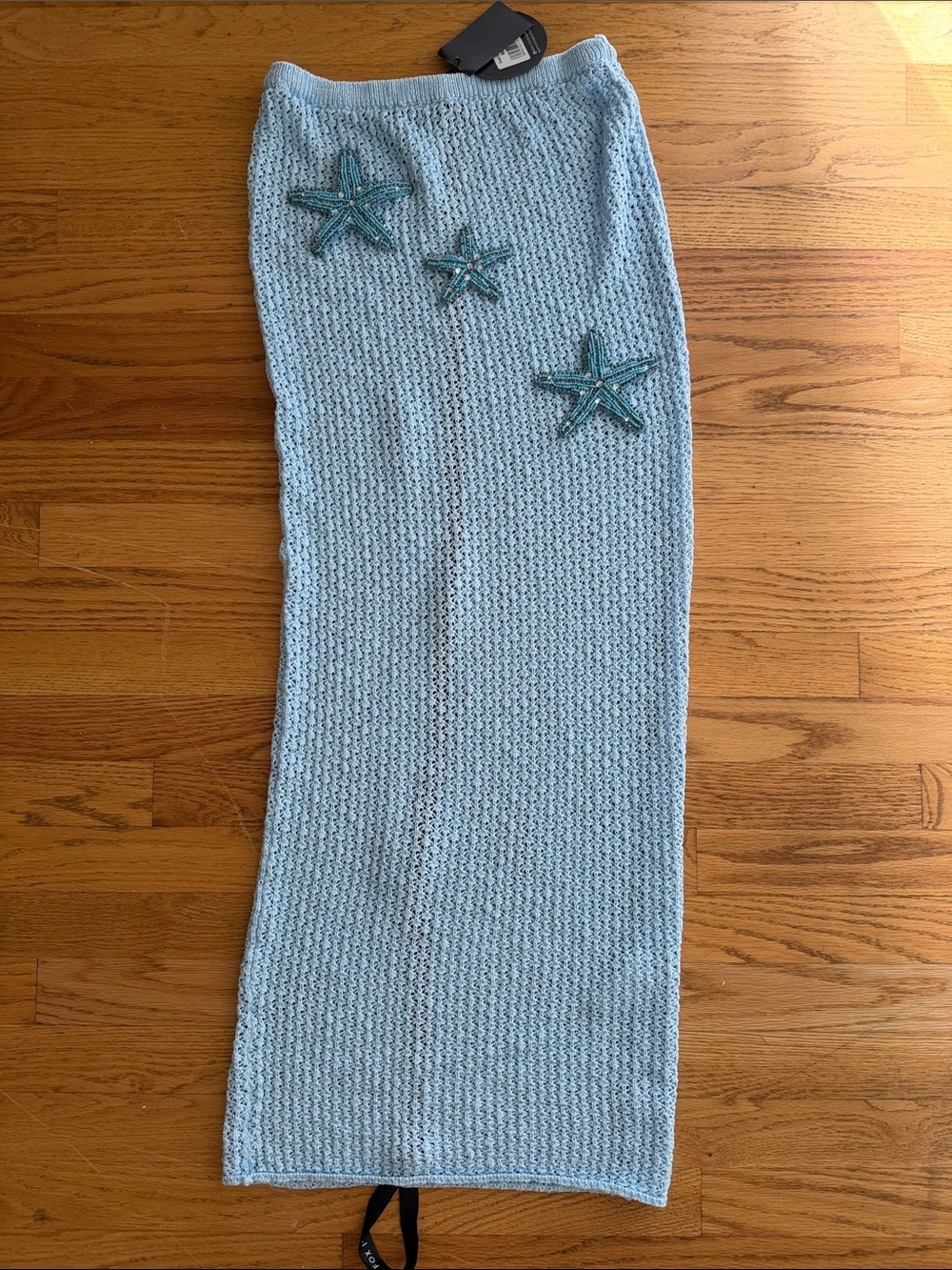 White Fox Boutique Light Blue Knit Swim Coverup Skirt with Starfish Appliqués